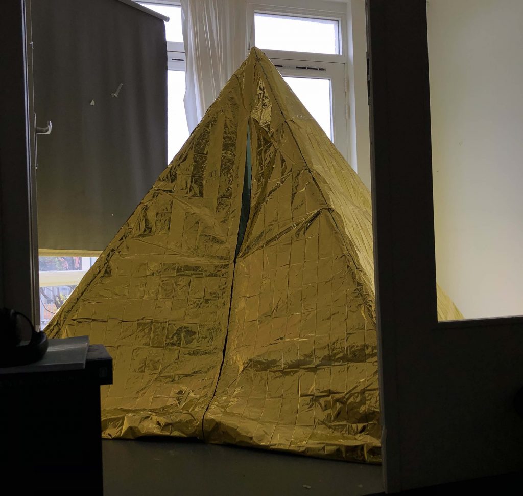 front gold pyramid